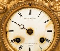 A French Gilt Metal Figural Clock — LATE 19TH CENTURY