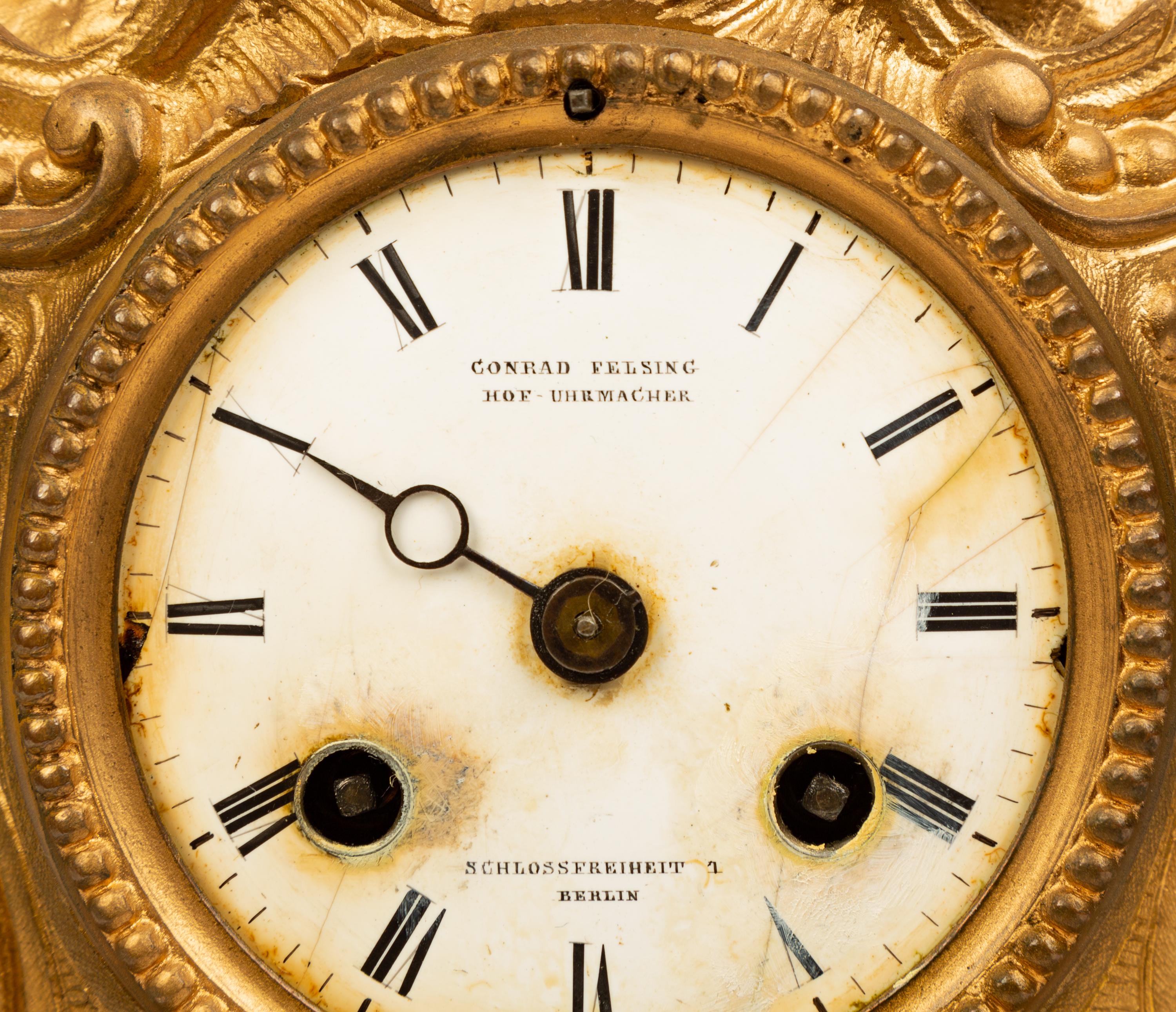A French Gilt Metal Figural Clock — LATE 19TH CENTURY
