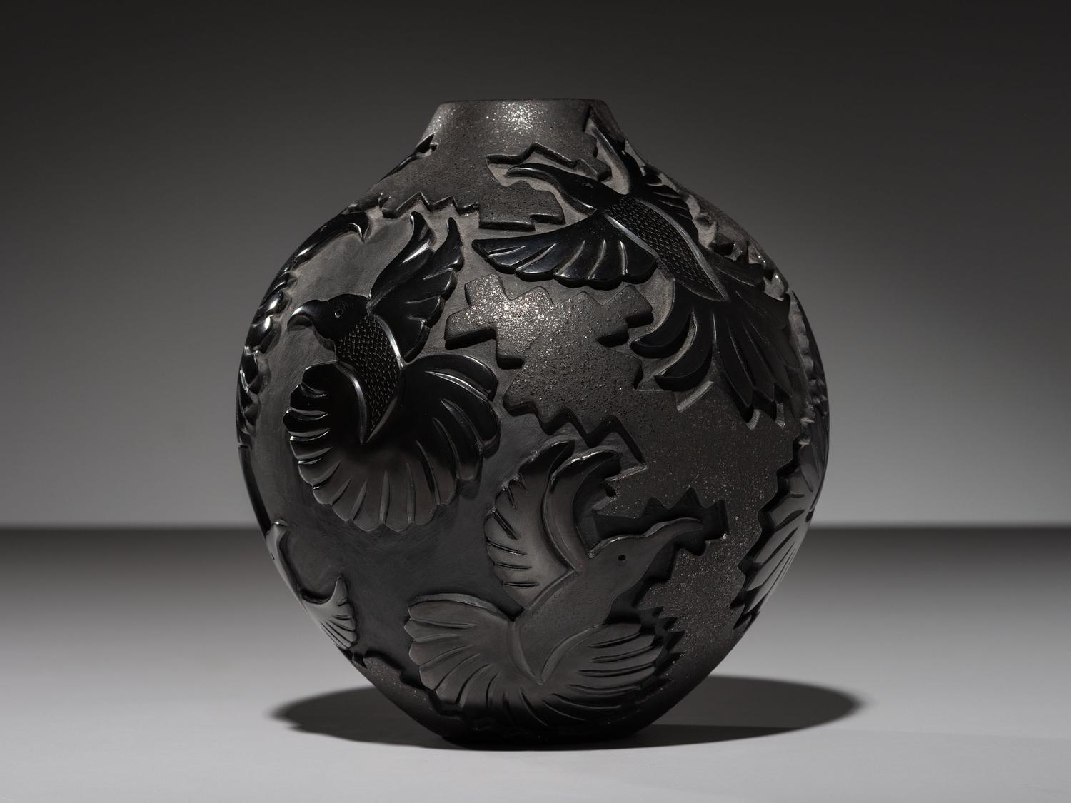 Carved Micaceous Blackware Jar, with Hummingbirds