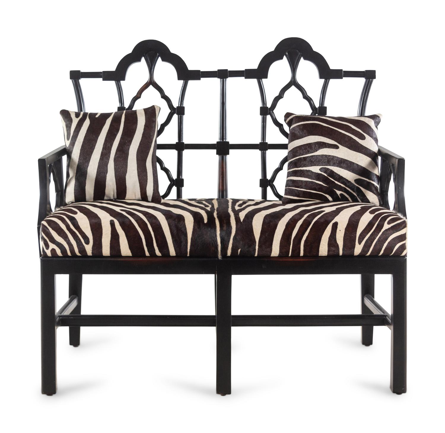 An Ebonized Chinese Chippendale Style Bench with Faux Zebra Cow Hide Upholstery