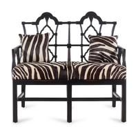 An Ebonized Chinese Chippendale Style Bench with Faux Zebra Cow Hide Upholstery