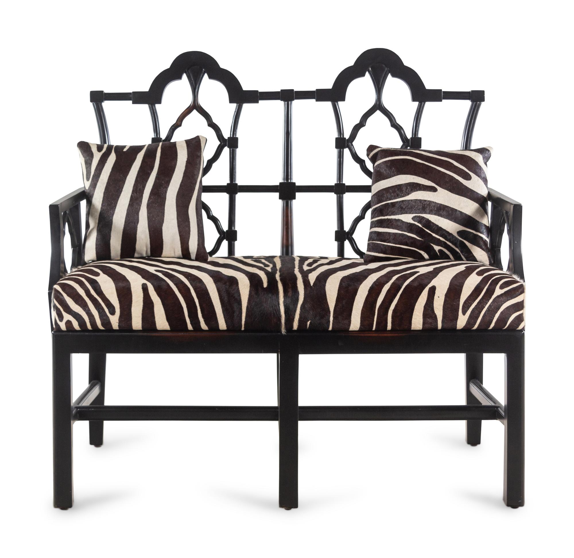 An Ebonized Chinese Chippendale Style Bench with Faux Zebra Cow Hide Upholstery