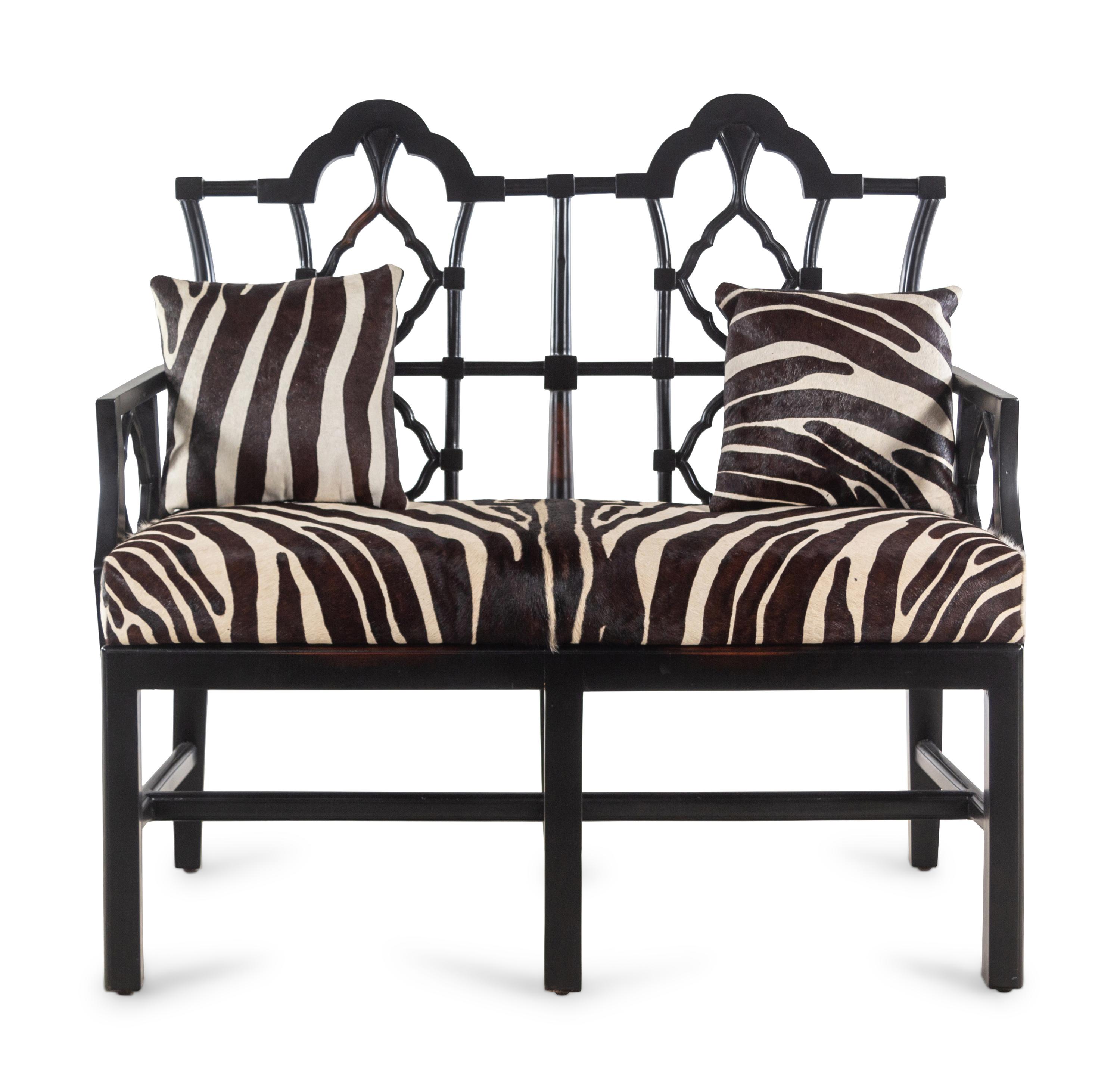 An Ebonized Chinese Chippendale Style Bench with Faux Zebra Cow Hide Upholstery
