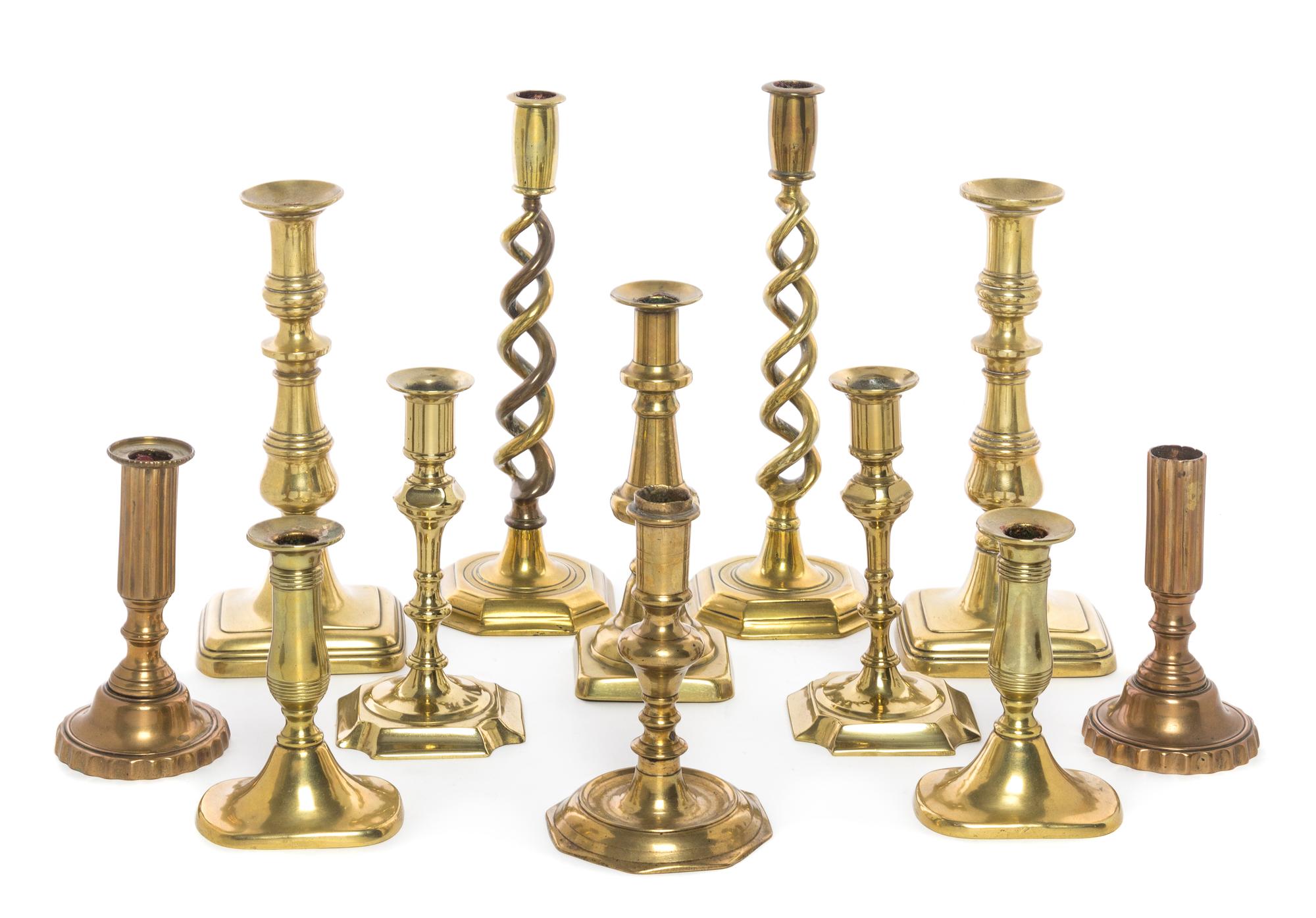 A Collection of Victorian Brass Candlesticks Height of tallest 11 3/4 inches. — 19TH CENTURY