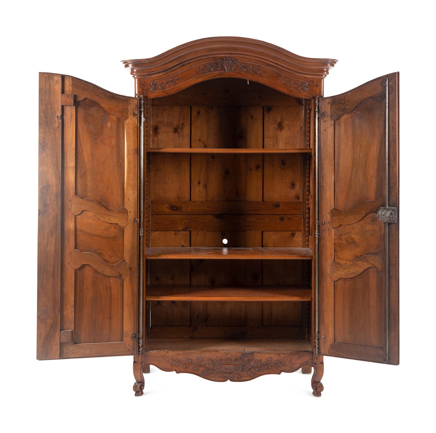 A Louis XV Provincial Walnut Armoire