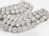 A Pair of Harry Winston Platinum and Diamond Earrings Harry Winston