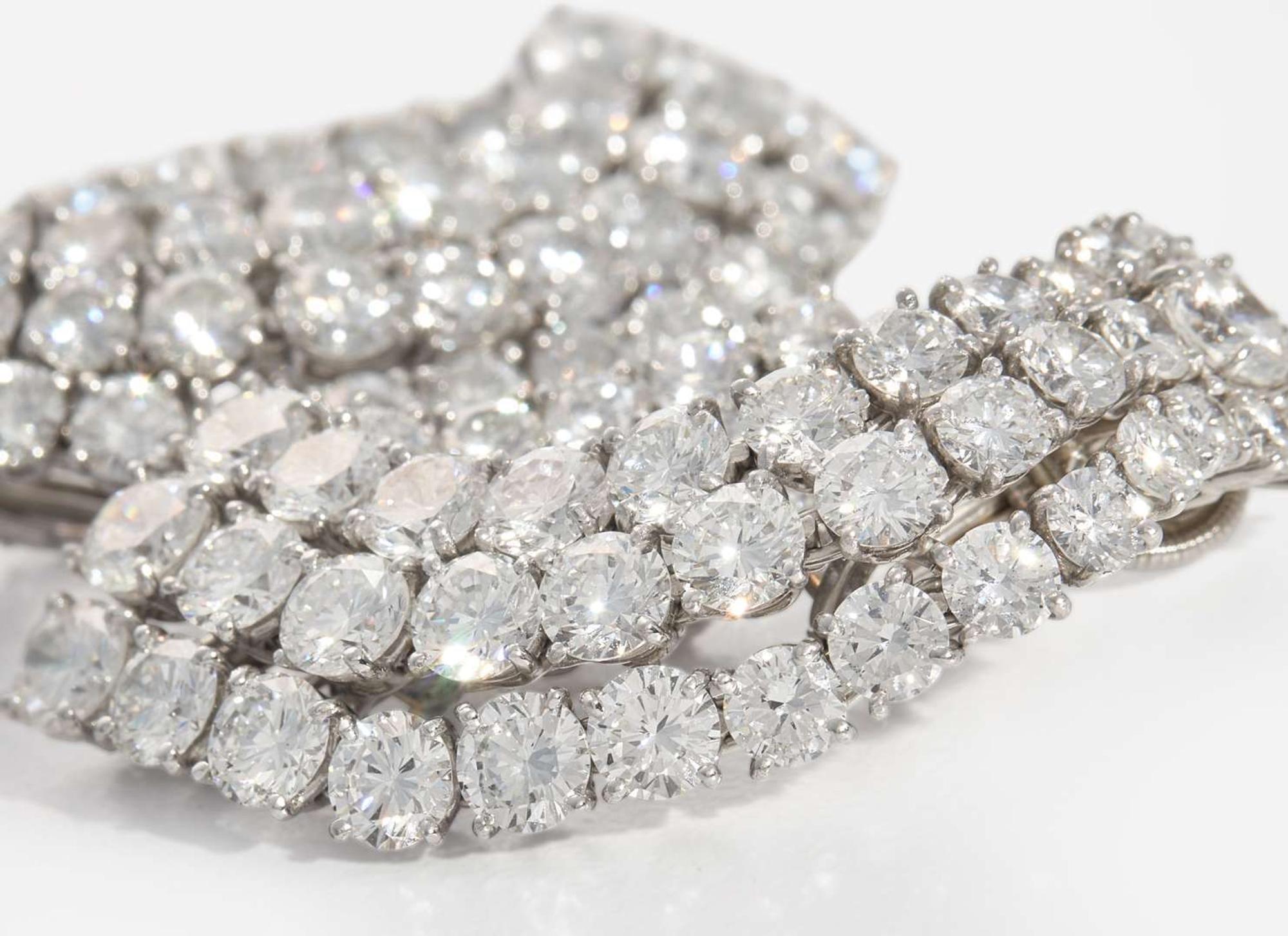 A Pair of Harry Winston Platinum and Diamond Earrings Harry Winston