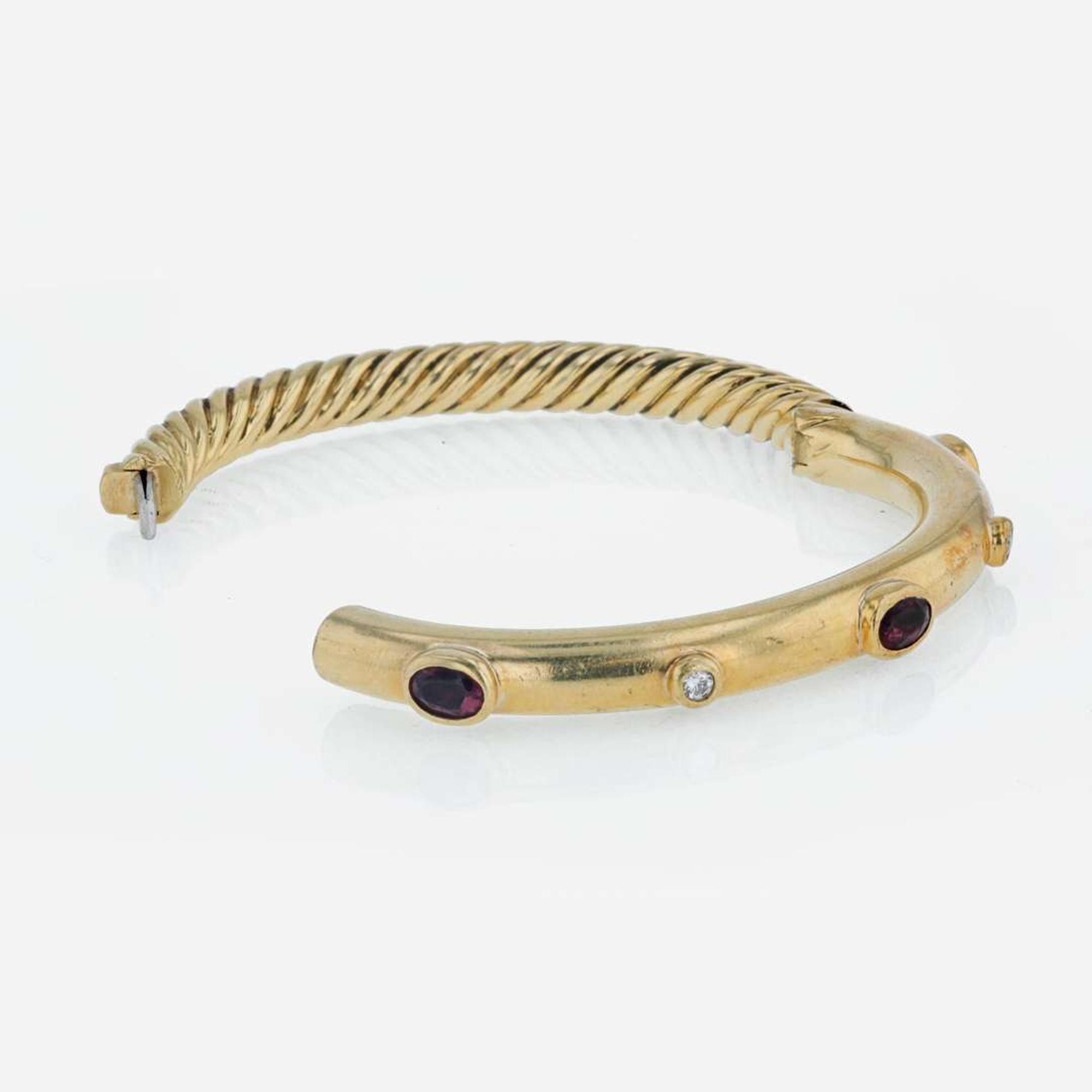 An 18K yellow gold, pink tourmaline, and diamond bangle, David Yurman