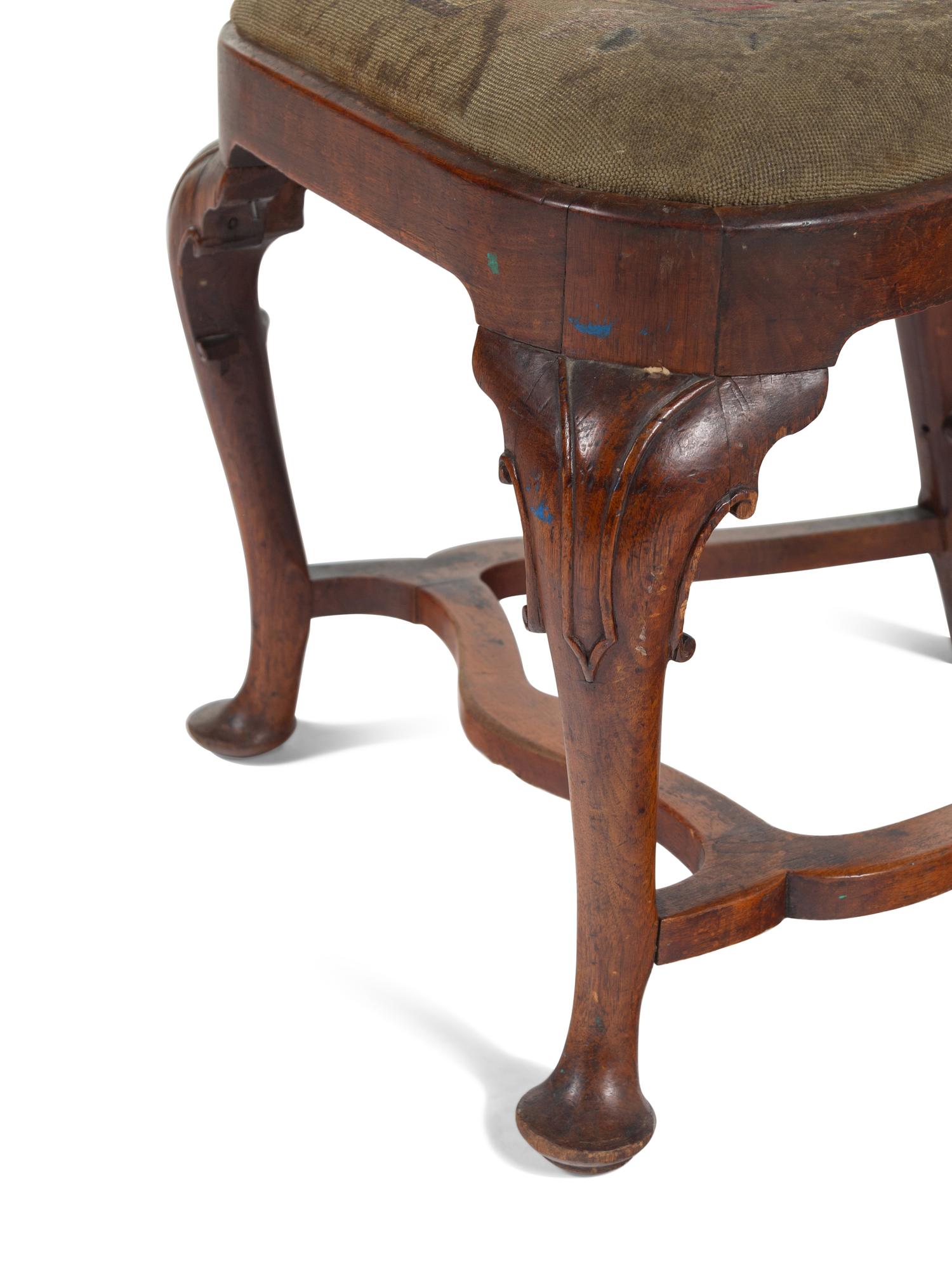 A Queen Anne Volute Carved Walnut Flat-Stretcher Pad-Foot Side Chair