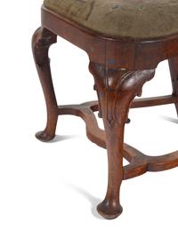 A Queen Anne Volute Carved Walnut Flat-Stretcher Pad-Foot Side Chair