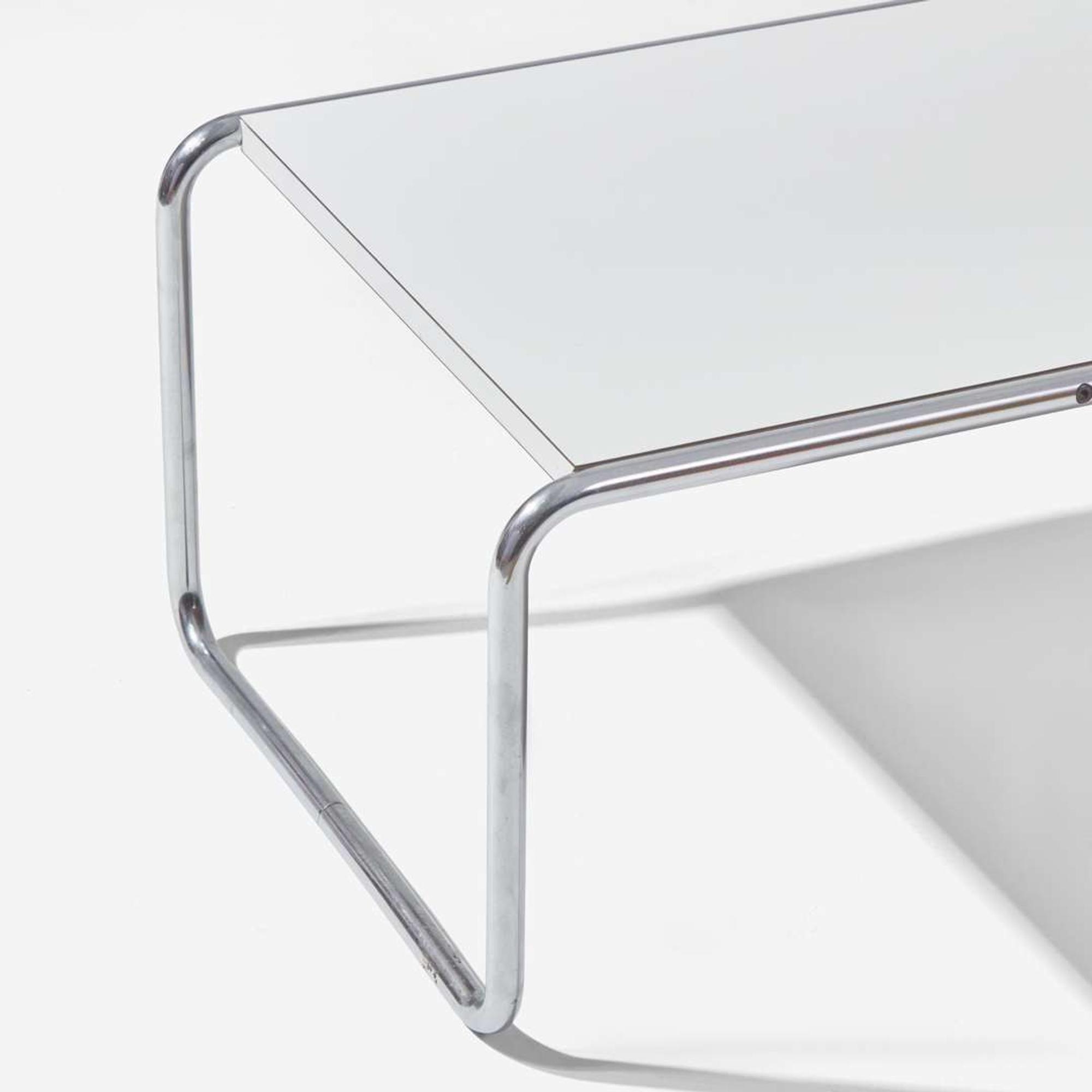 American Modern and Marcel Breuer (American, b. Hungary, 1902-1981) Even Arm Sofa, USA, circa 1960s, and a "Laccio" Coffee Table, designed 1925, the present lot circa 1970s