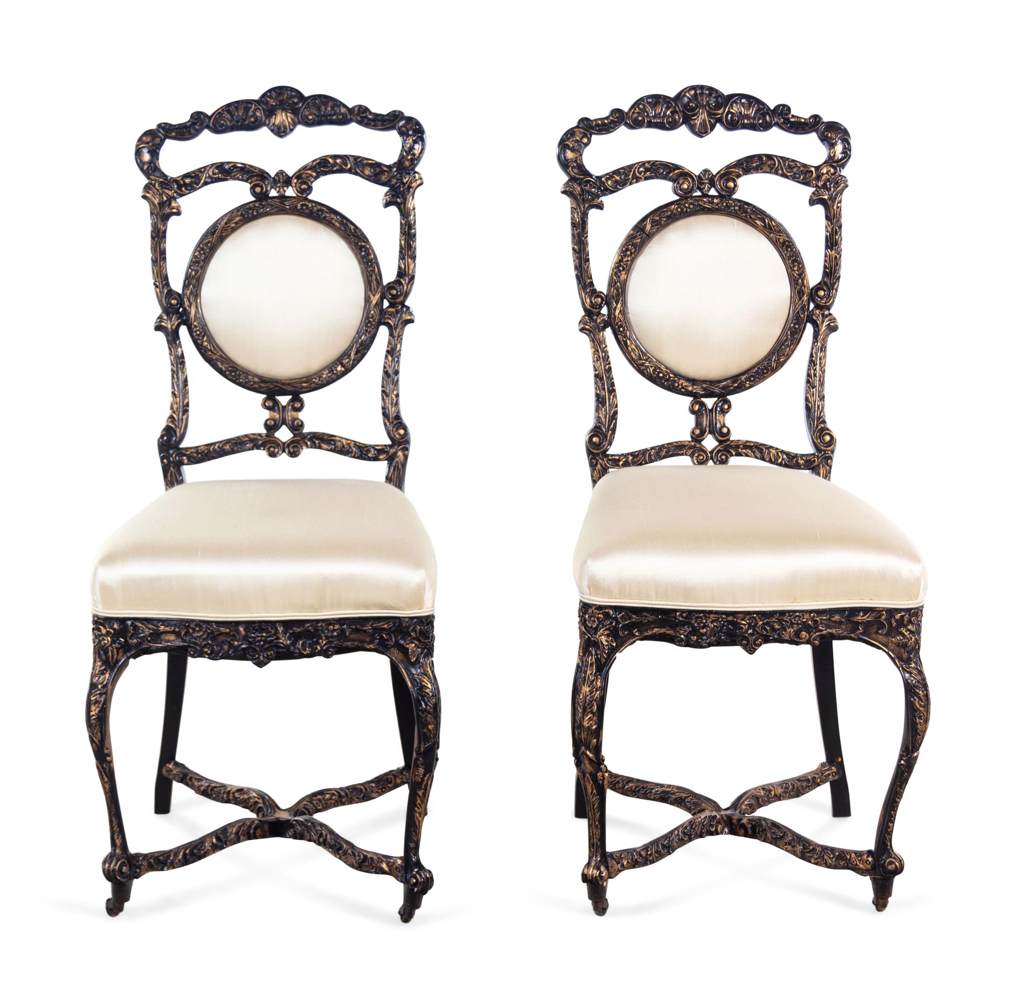 A Pair of Louis XV Style Ebonized and Gilded Side Chairs