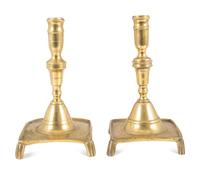 A Matched Pair of Continental Brass Footed and Dished Square Base Candlesticks