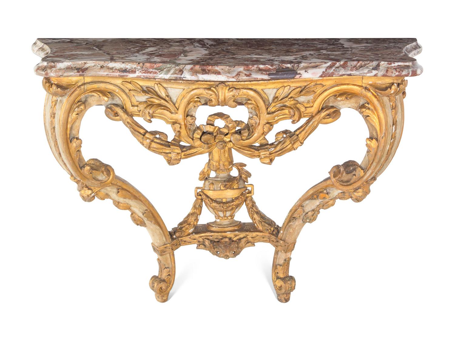 An Italian Rococo Parcel-Gilt and White-Painted Carved Wood Marble-Top Console Table