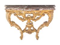 An Italian Rococo Parcel-Gilt and White-Painted Carved Wood Marble-Top Console Table
