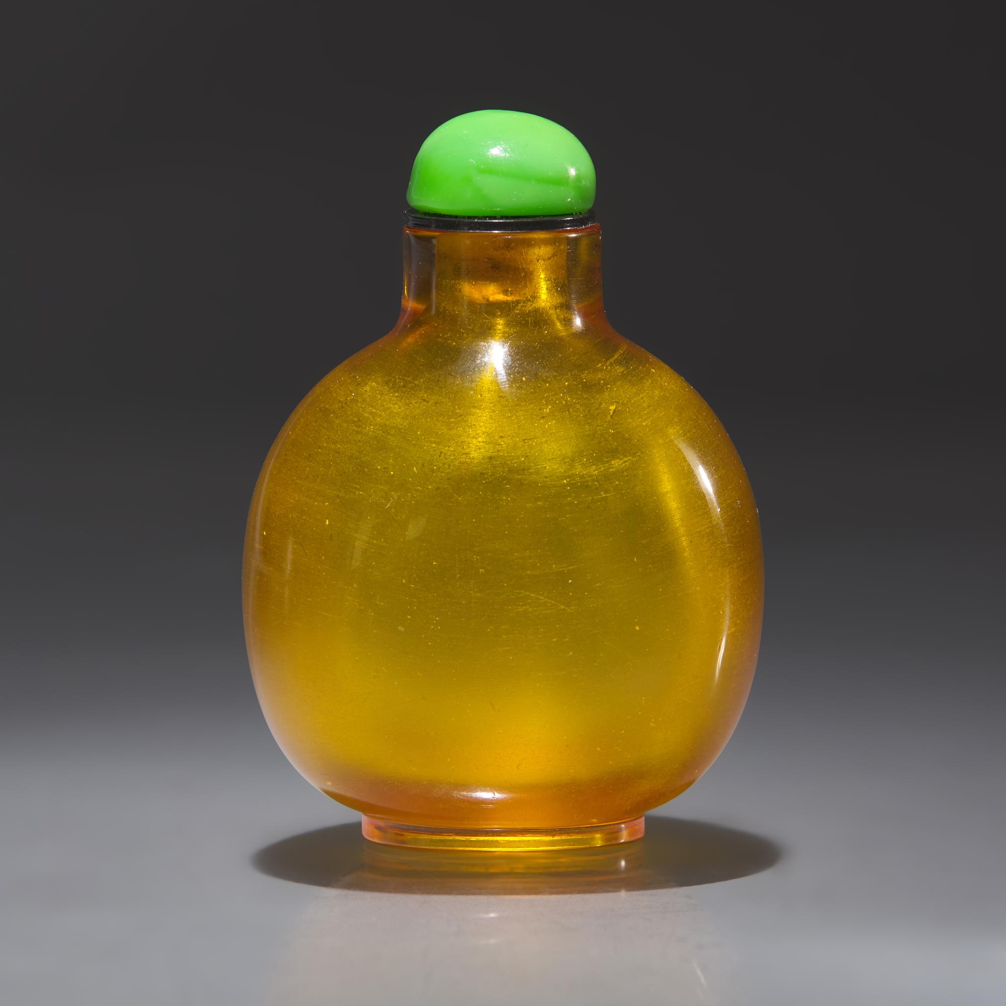 A Chinese Yellow Glass Snuff Bottle, Qing Dynasty, Early 19th Century — 清中期 黃料素面鼻煙壺