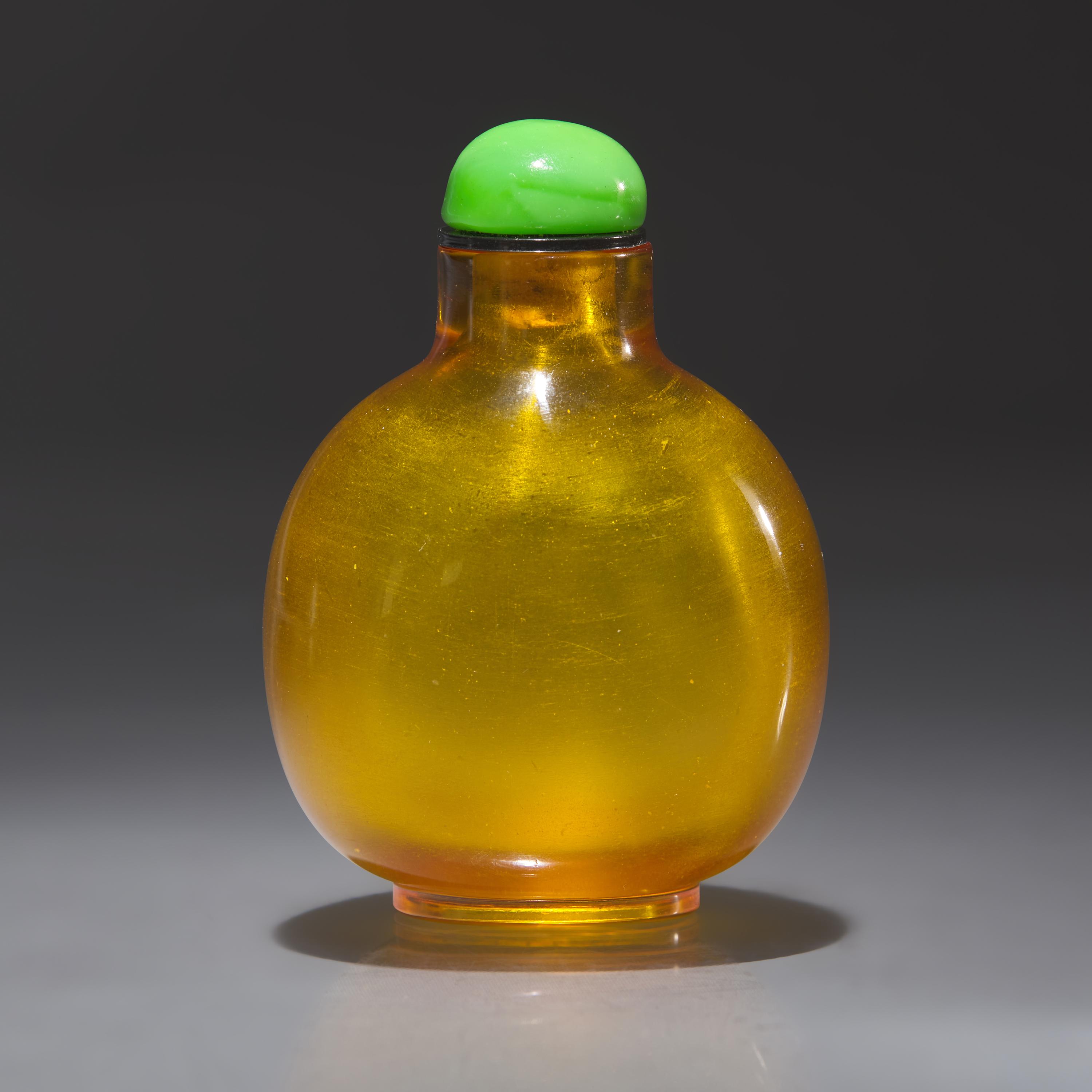 A Chinese Yellow Glass Snuff Bottle, Qing Dynasty, Early 19th Century — 清中期 黃料素面鼻煙壺
