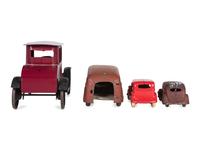 A Group of Toy Service Stations and Cars