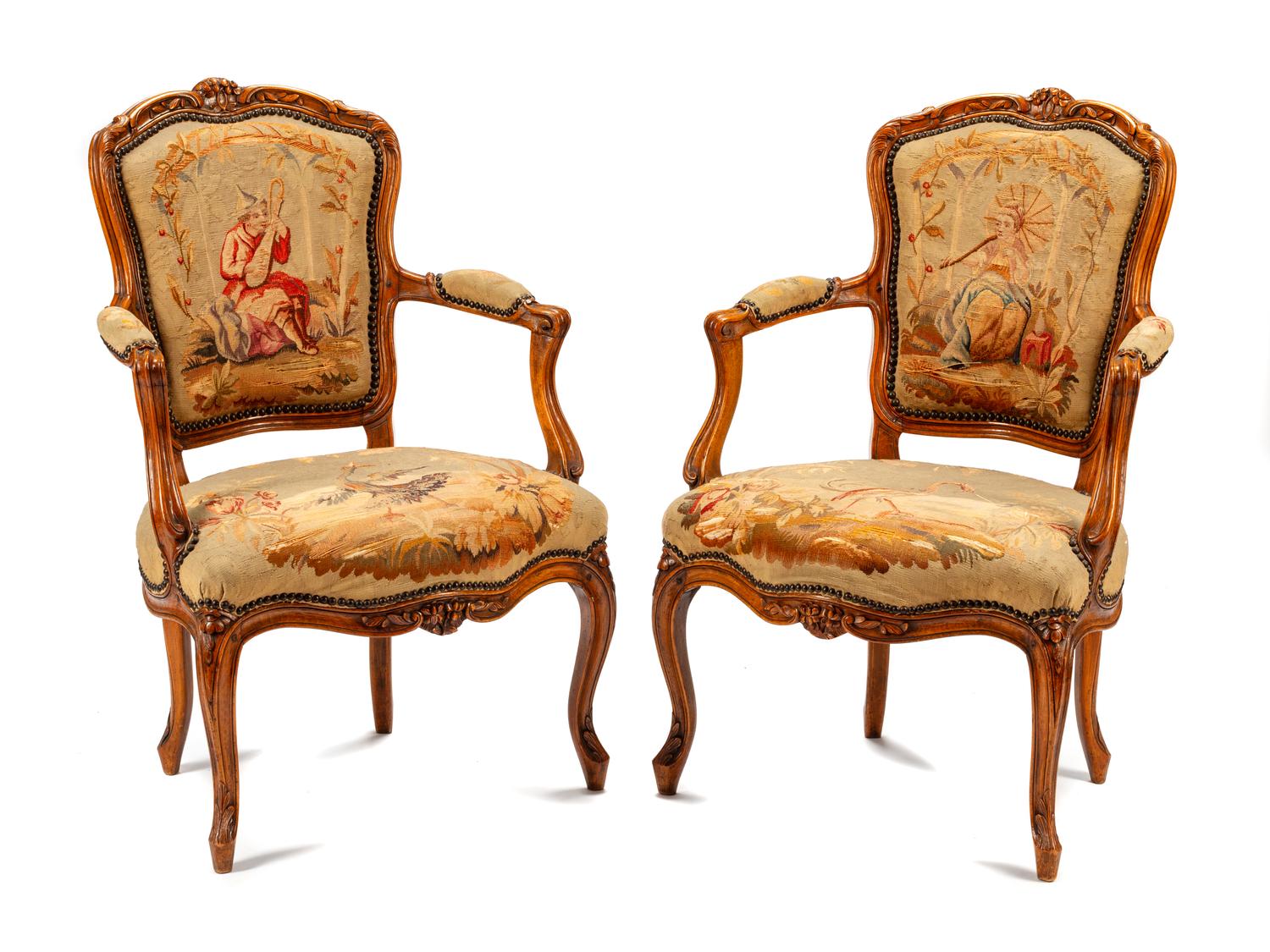 A Pair of Louis XV Tapestry-Upholstered Walnut Fauteuils