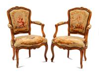 A Pair of Louis XV Tapestry-Upholstered Walnut Fauteuils