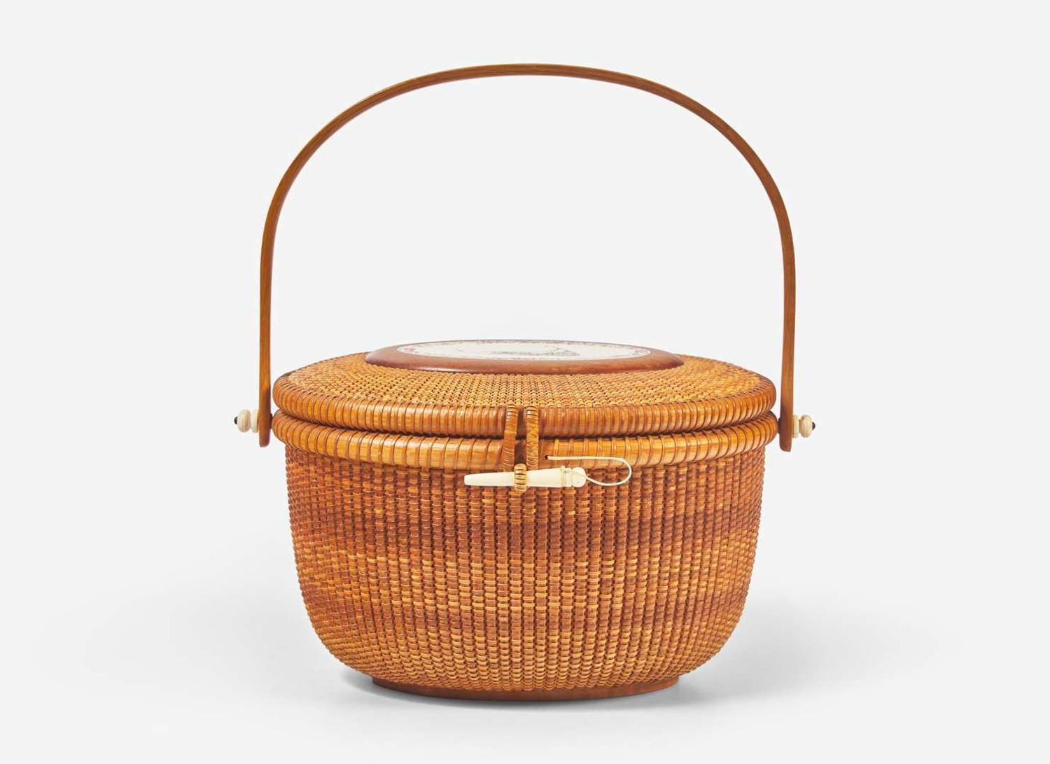 A Nantucket basket, Alan S. W. Reed, with scrimshaw plaque by Lee Anne Papale, dated "1989"