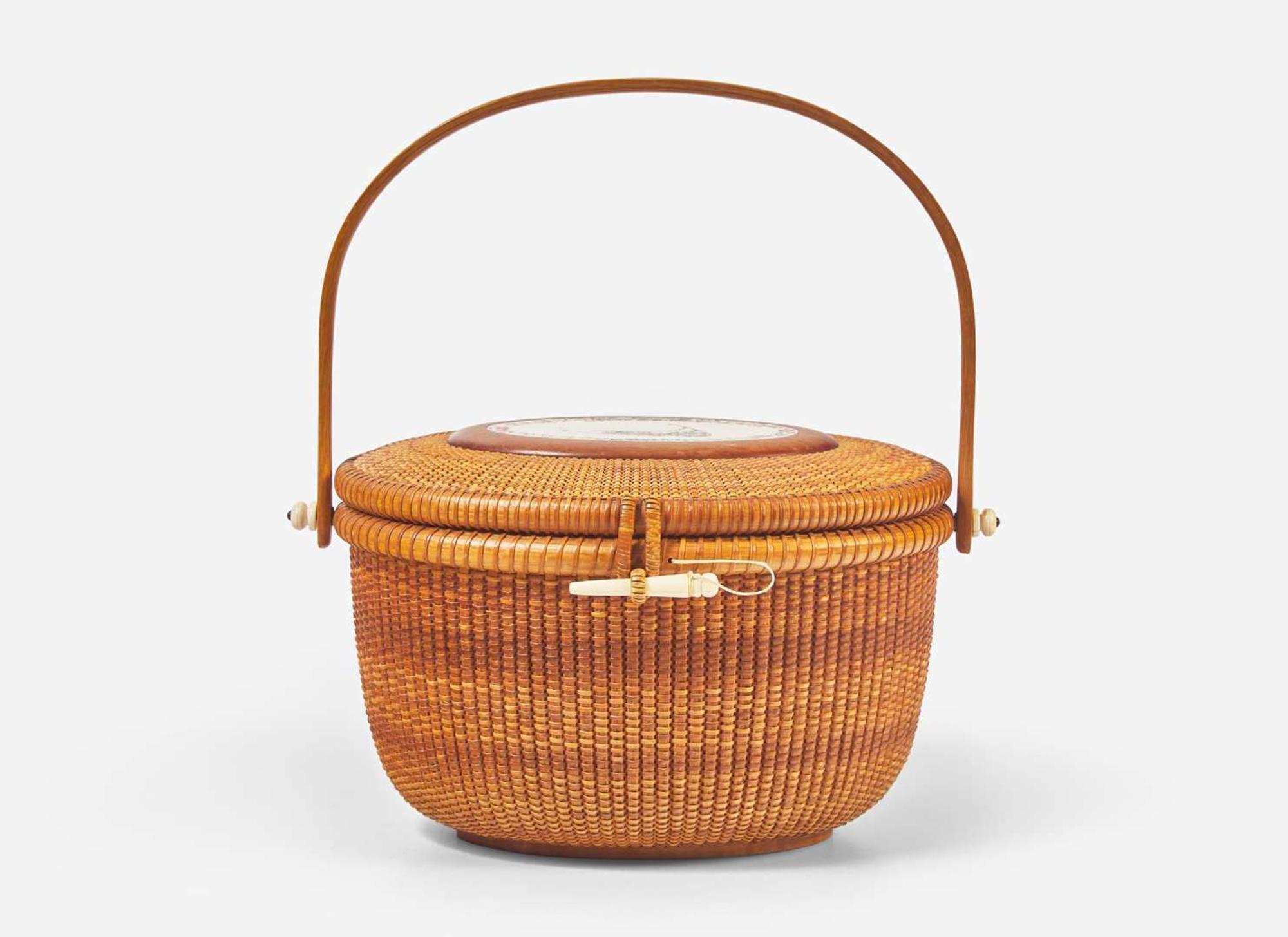 A Nantucket basket, Alan S. W. Reed, with scrimshaw plaque by Lee Anne Papale, dated "1989"
