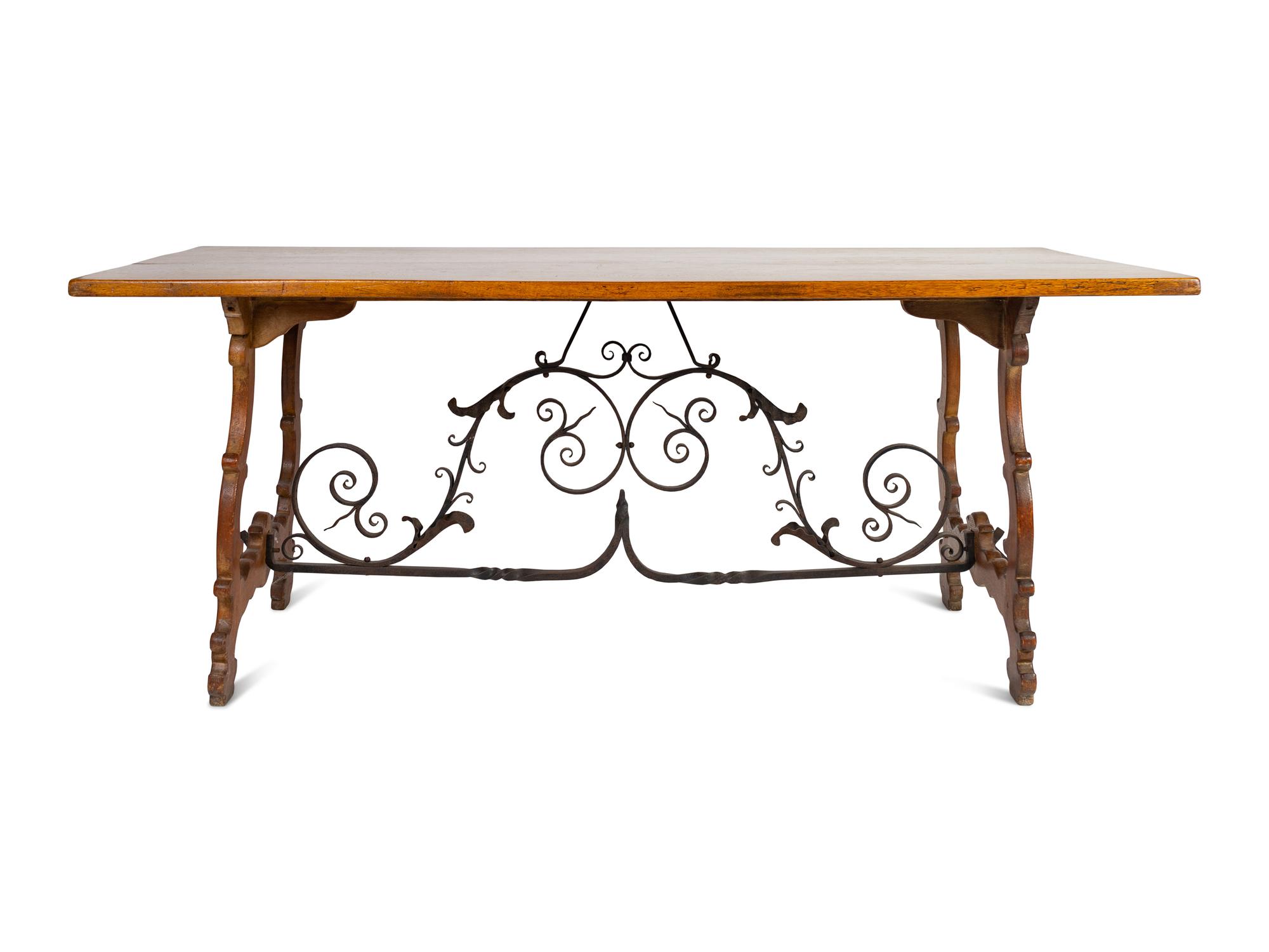 A Spanish Baroque Style Iron-Mounted Oak Trestle Table