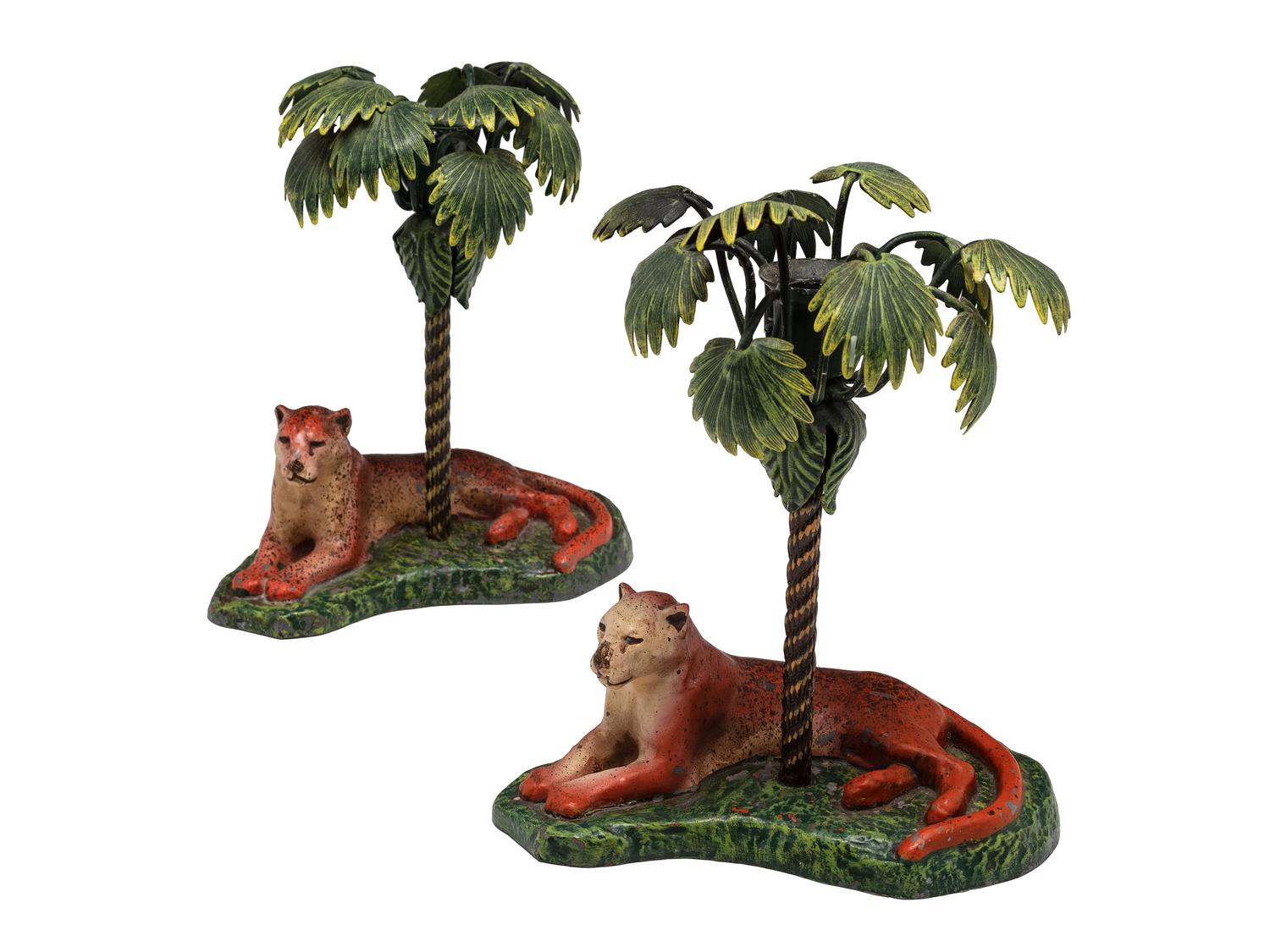 A Pair of Cold Painted Bronze Lion Candlesticks