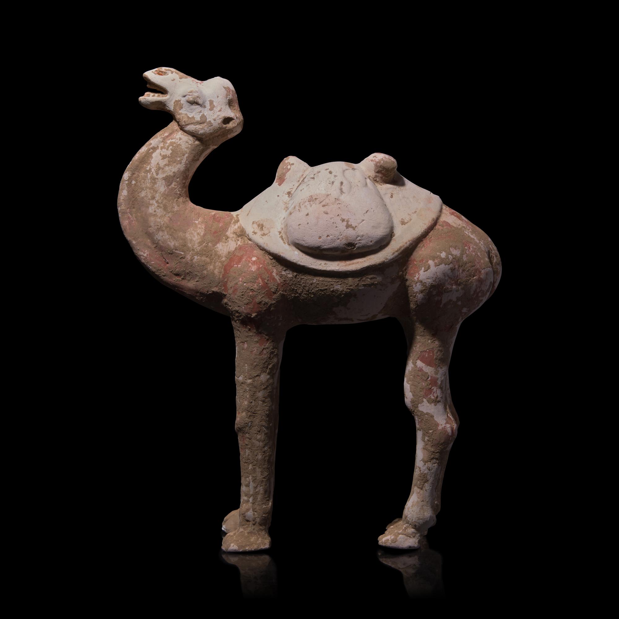 A Chinese Painted Pottery Figure of a Camel and A Pottery Figure of an Attendant, Tang Dynasty 唐 彩陶駱駝及男佣各一