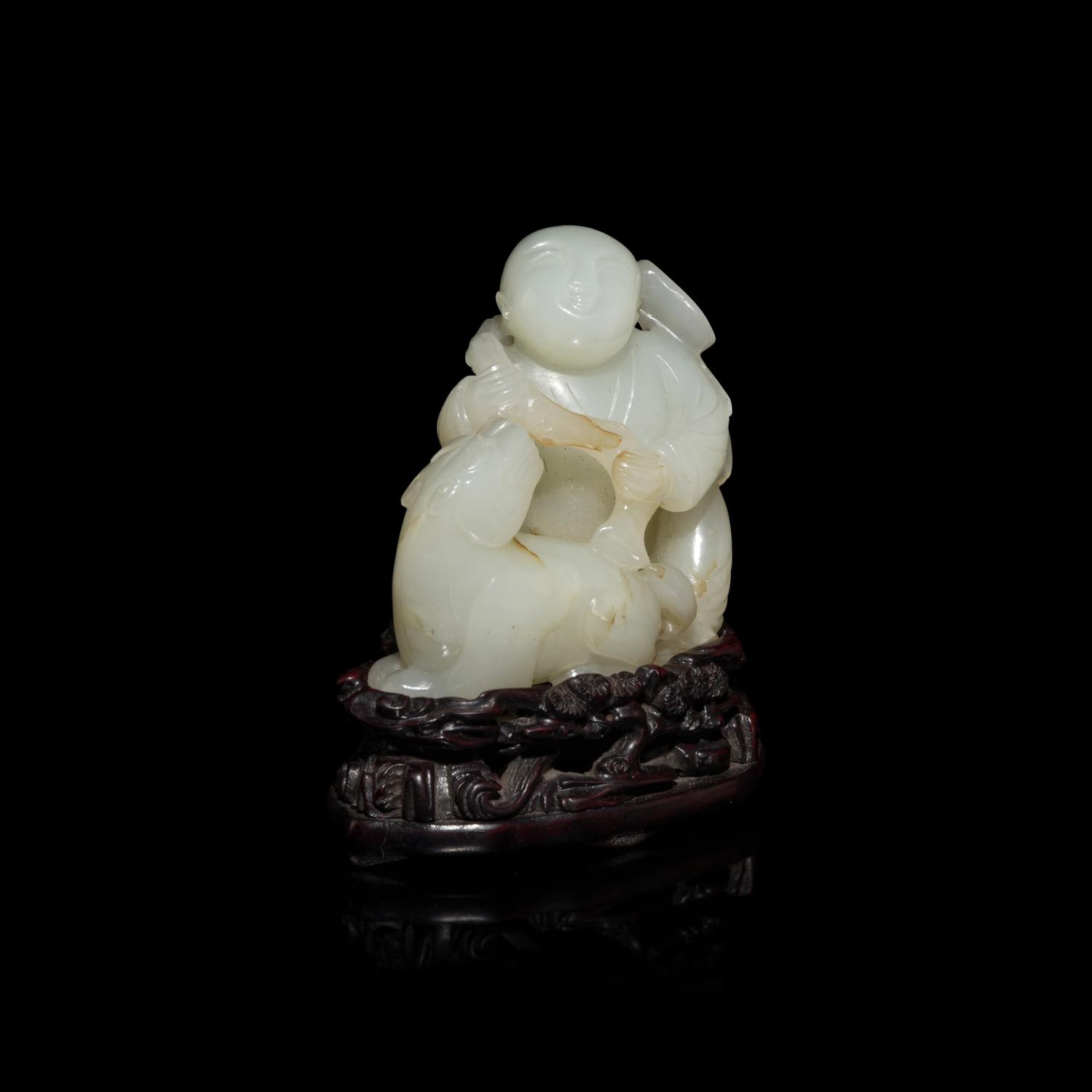 A Chinese White Jade Carving of Boy and Mythical Beast 白玉童子瑞獸把件