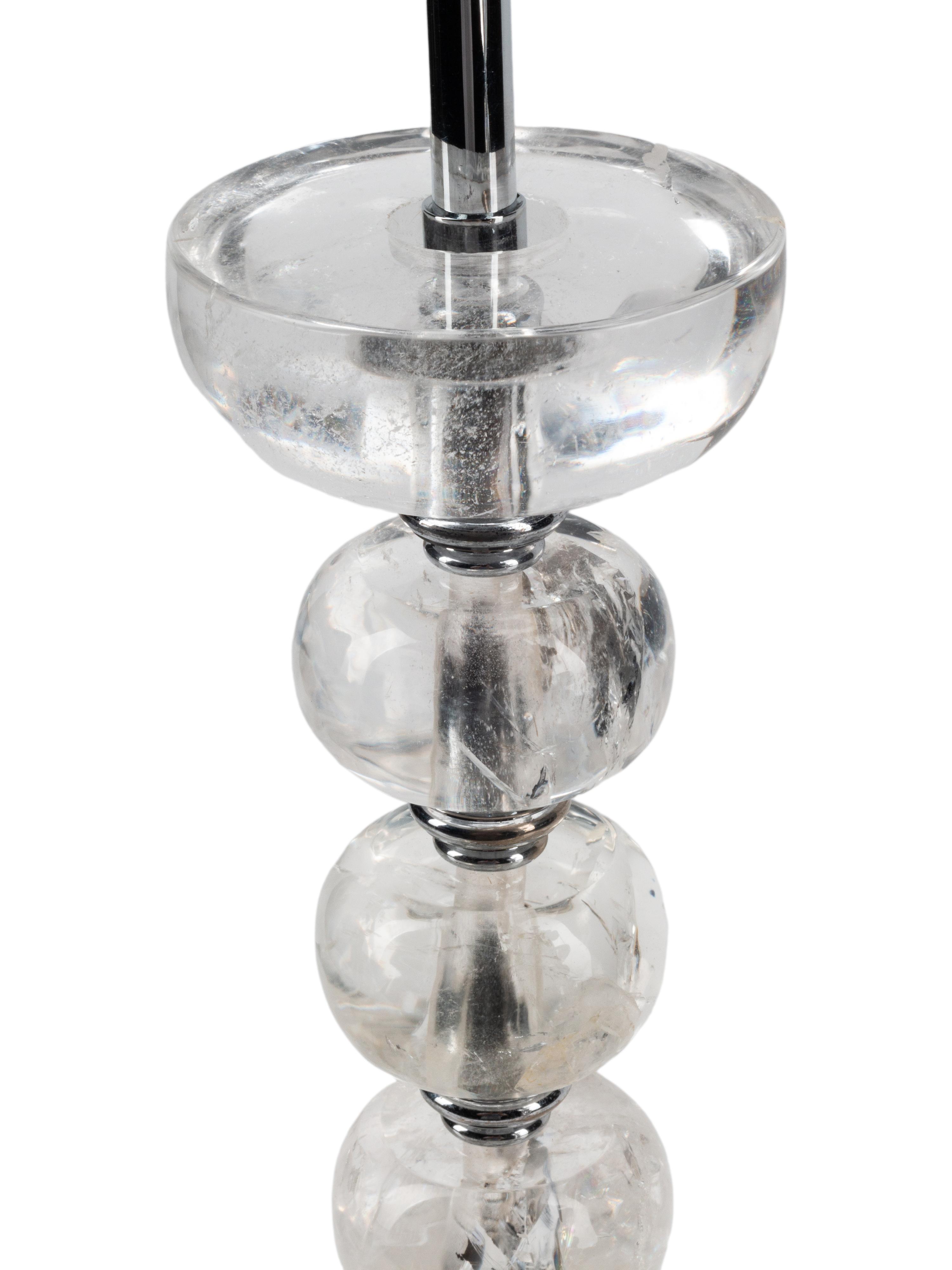 A Pair of Rock Crystal and Silvered Wood Table Lamps