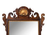 A George III Parcel Gilt Mahogany Mirror