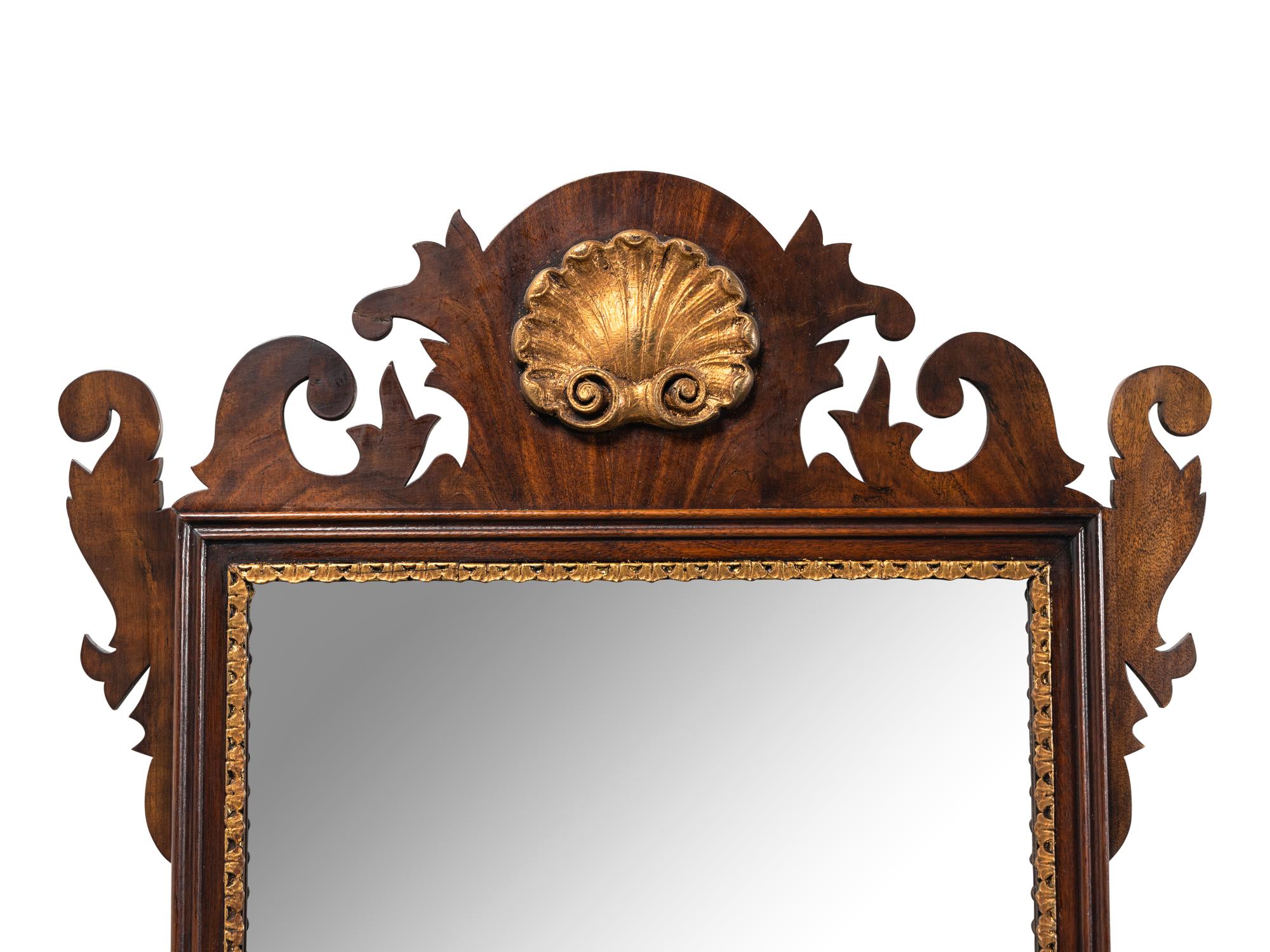 A George III Parcel Gilt Mahogany Mirror
