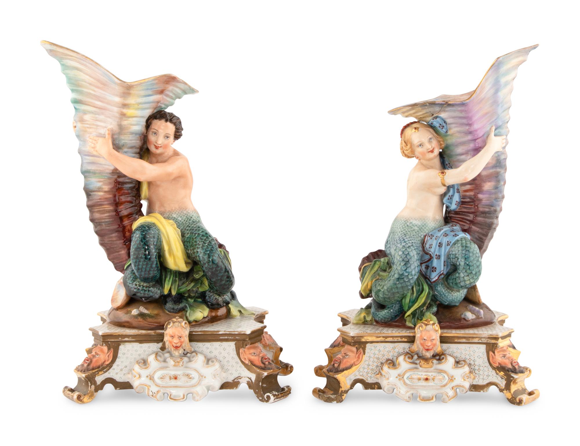 A Pair of Continental Porcelain Figural Vases