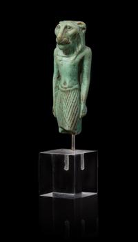 An Egyptian Faience Amulet of Mahes Height 2 1/4 inches. — LATE PERIOD TO PTOLEMAIC PERIOD, 664-30 B.C.E.