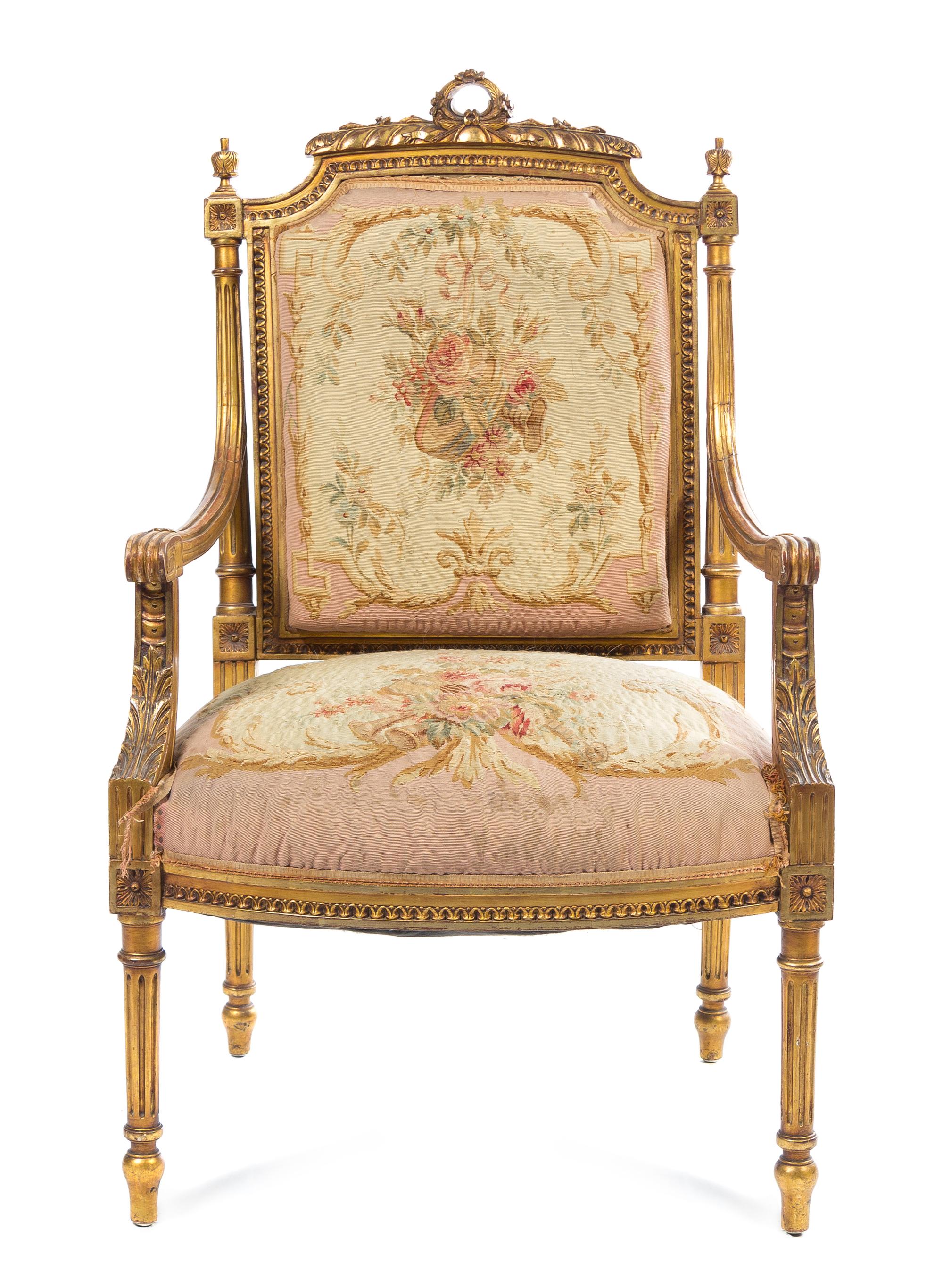 A Louis XVI Style Giltwood Fauteuil Height 40 inches. — 19TH CENTURY