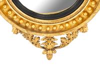 A Regency Giltwood Bullseye Mirror