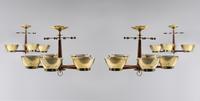 Group of Four Brass Modernist Five-Light Chandeliers