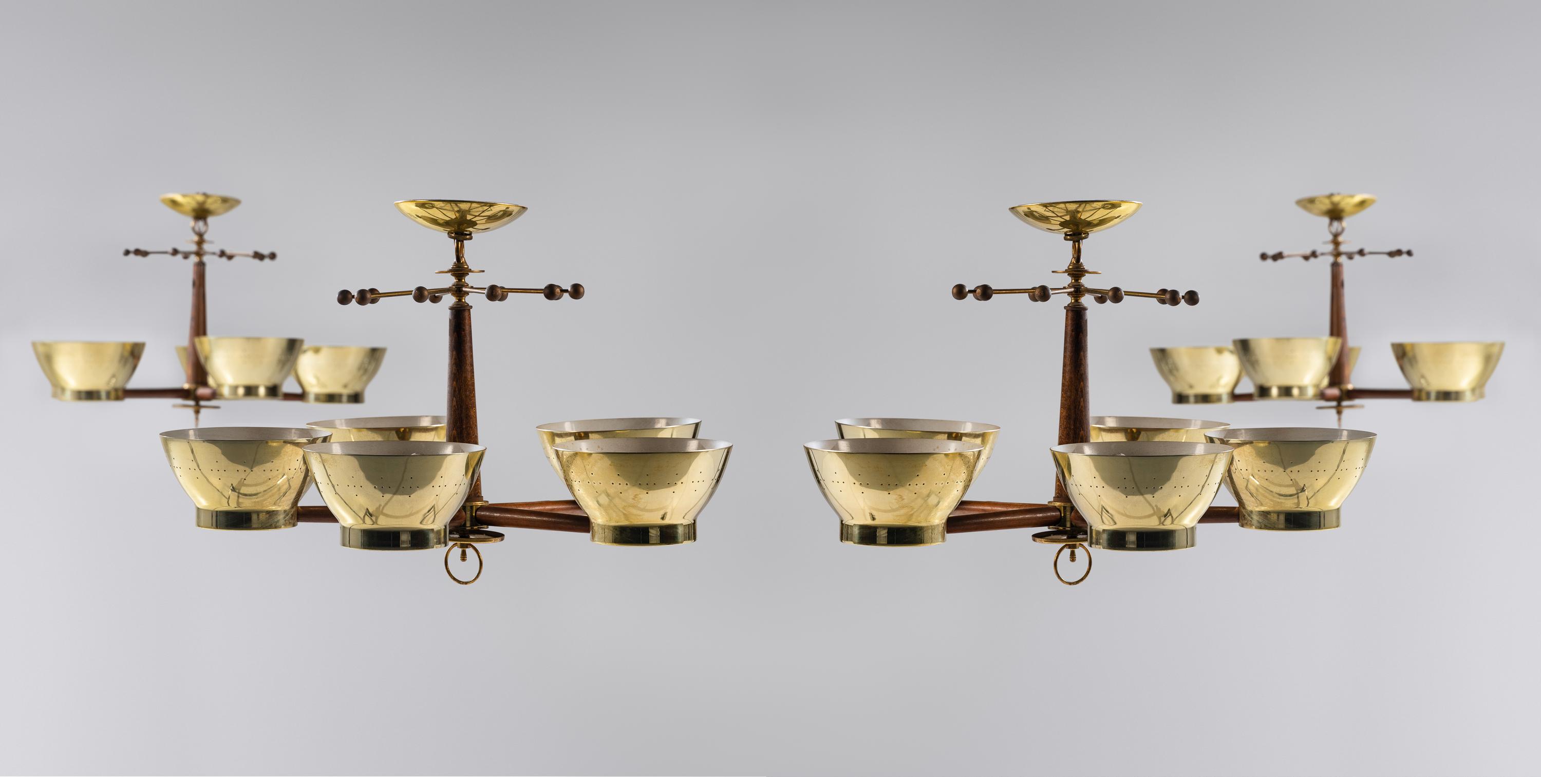 Group of Four Brass Modernist Five-Light Chandeliers