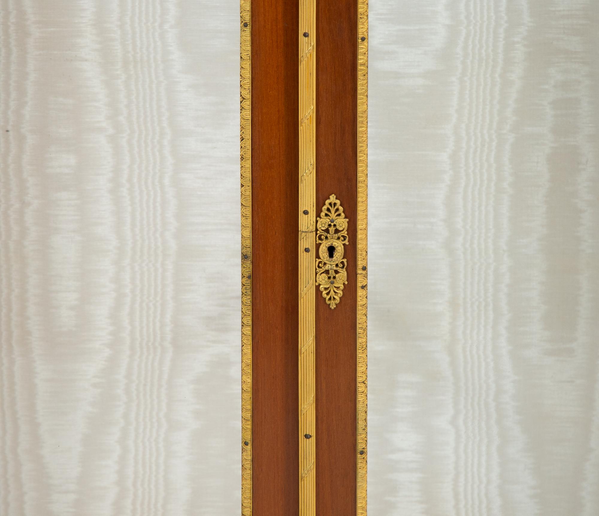 A Pair of Empire Style Gilt Bronze Mounted Mahogany Marble Top Vitrine Cabinets