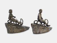Two Figural Sculptures on Sleds Argentor, Vienna