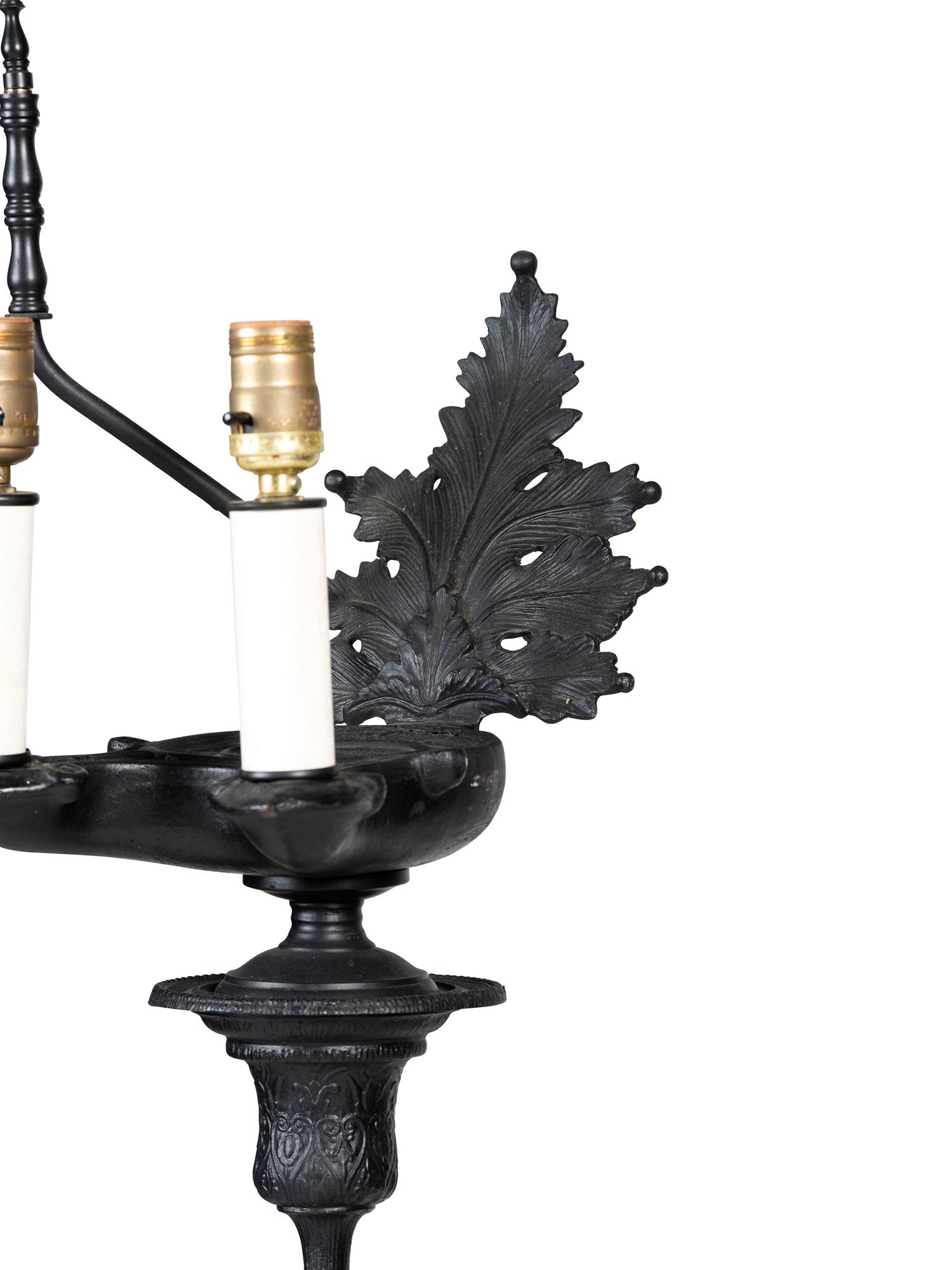 A Pair of Neoclassical Style Cast Metal Floor Lamps
