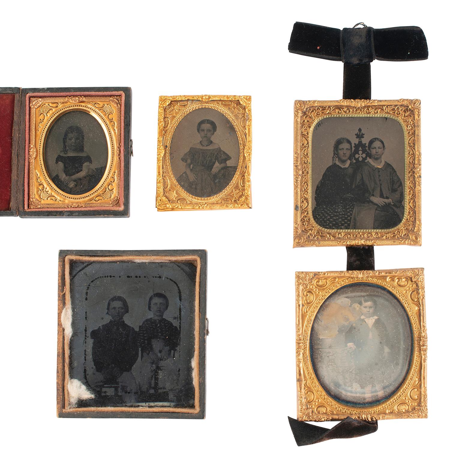 [EARLY PHOTOGRAPHY]. 19 assorted images featuring children & babies, mostly ambrotypes & tintypes.