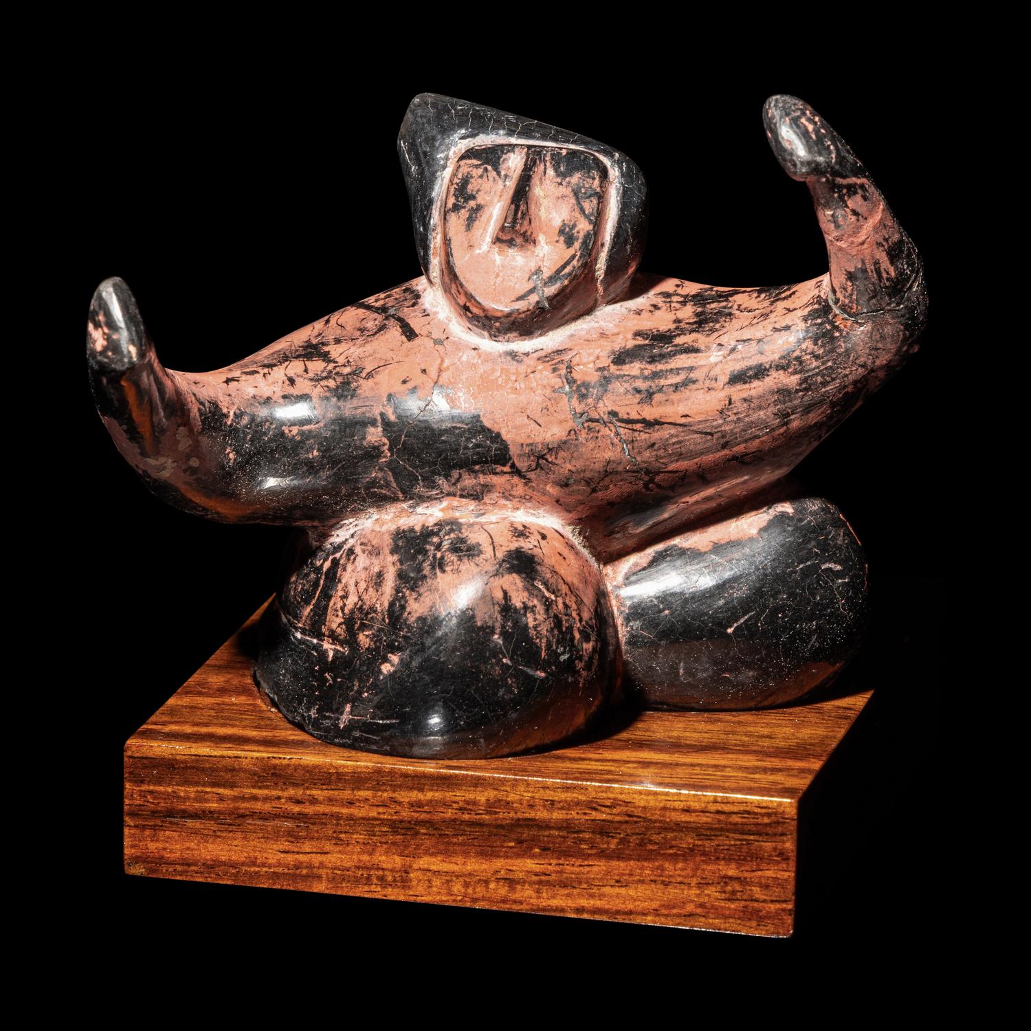 A Chinese Black and Red Lacquered Pottery 'Dancing Figure', Warring States or Later 戰國或以後 黑陶朱漆舞俑