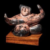 A Chinese Black and Red Lacquered Pottery 'Dancing Figure', Warring States or Later 戰國或以後 黑陶朱漆舞俑