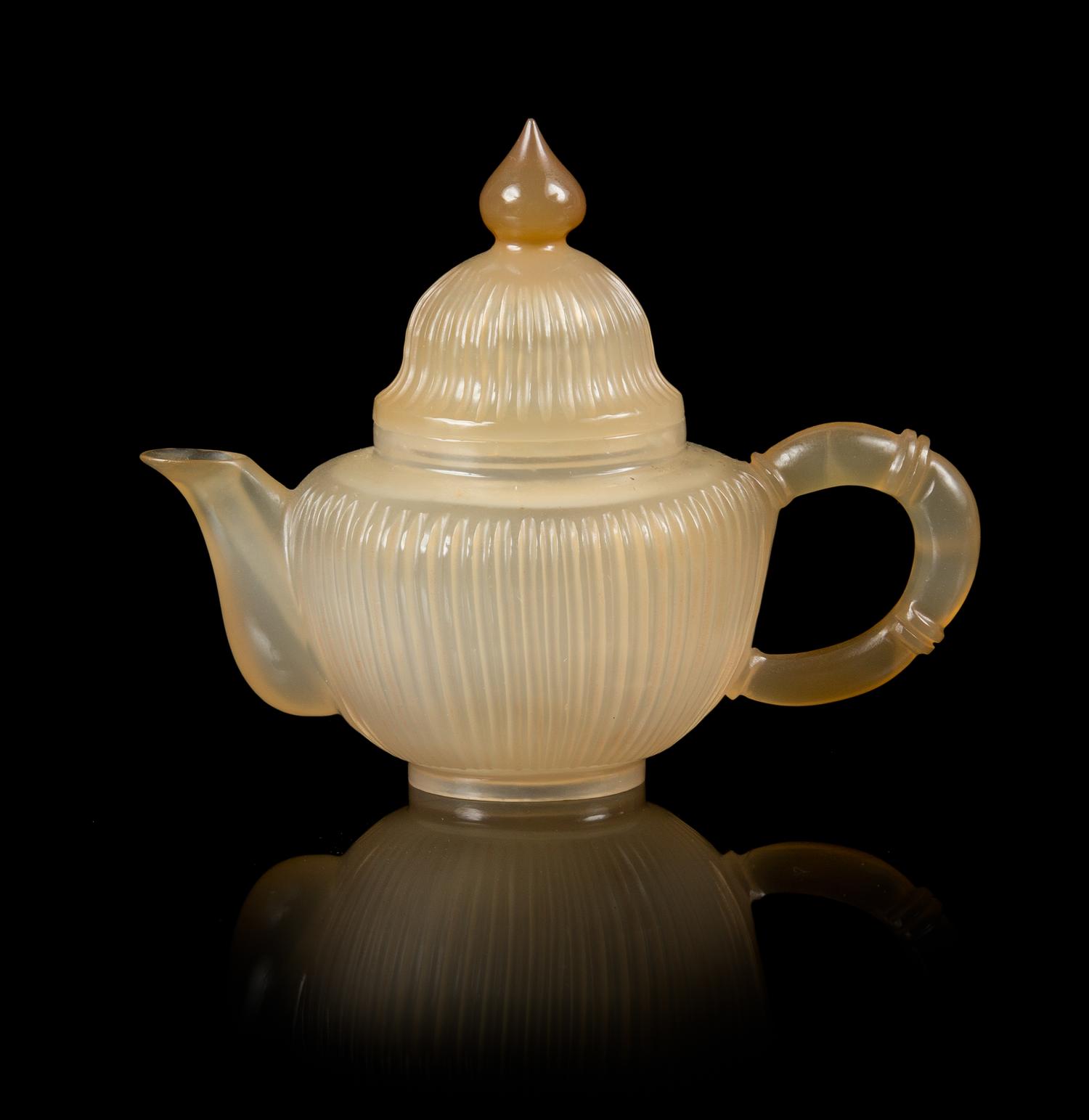 A Carved Agate Teapot Height 5 inches.
