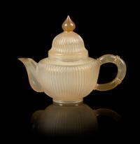 A Carved Agate Teapot Height 5 inches.