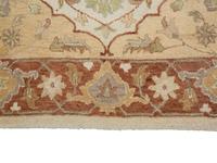 An Agra Wool Rug — 20TH CENTURY