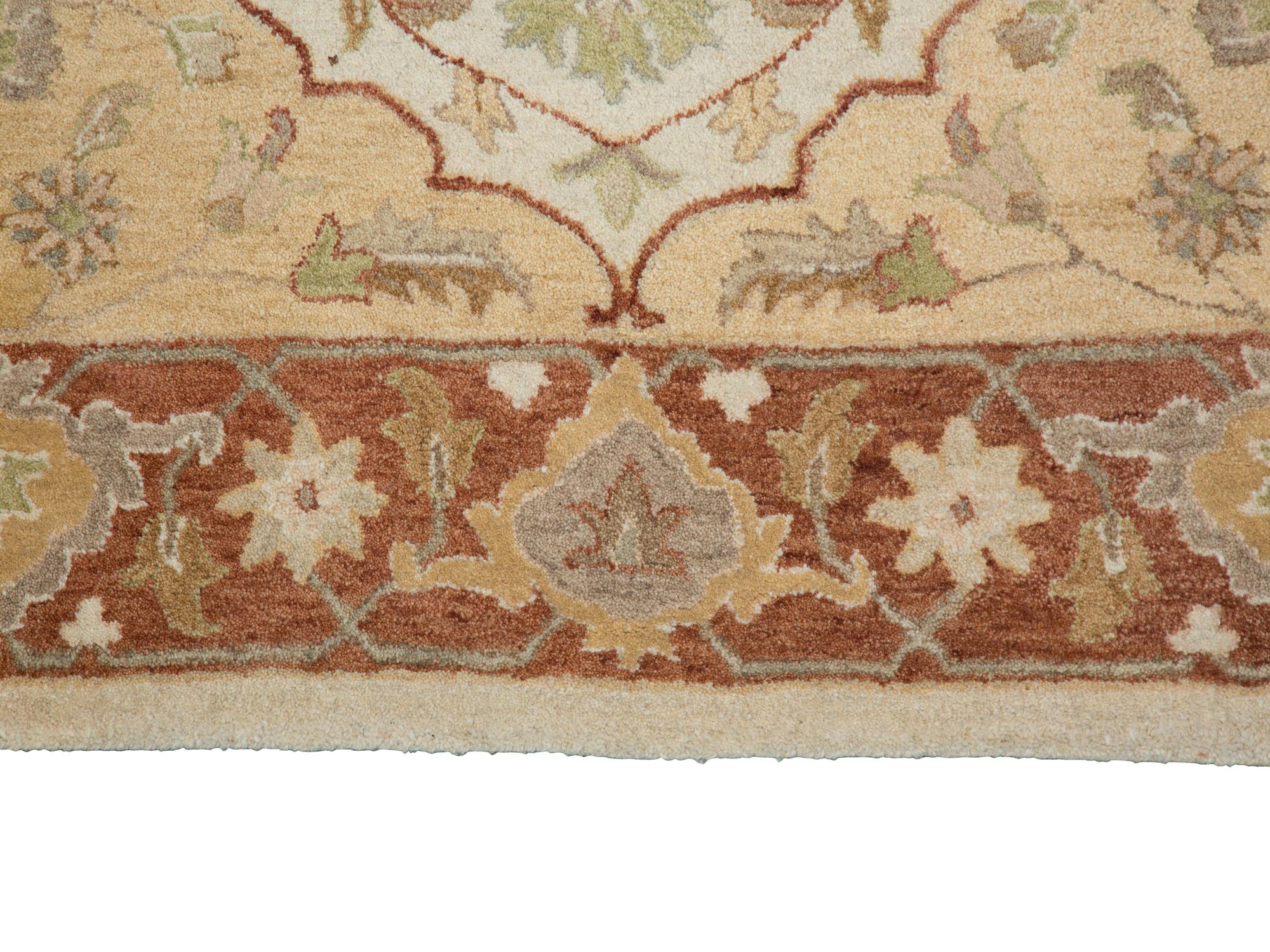 An Agra Wool Rug — 20TH CENTURY