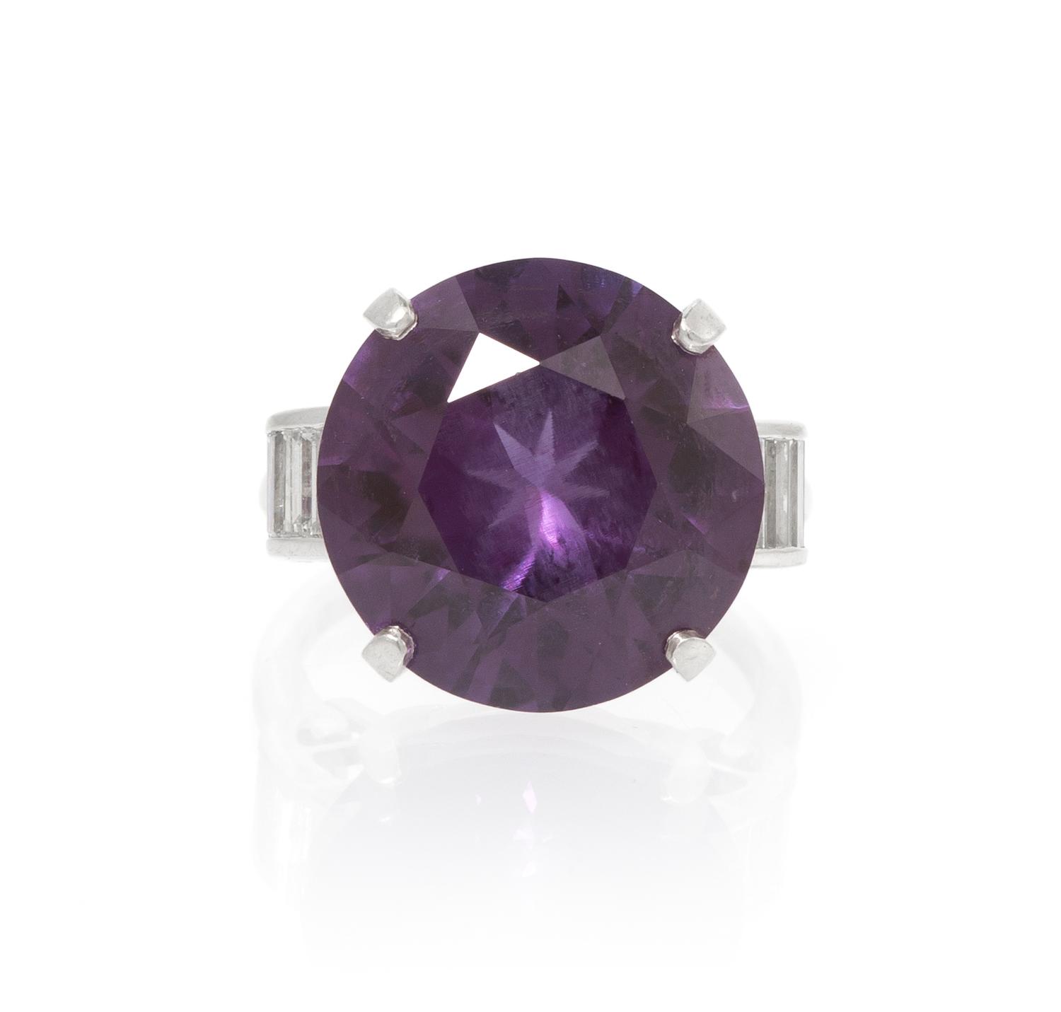 A Platinum, Synthetic Color Change Sapphire and Diamond Ring, 6.80 dwts.